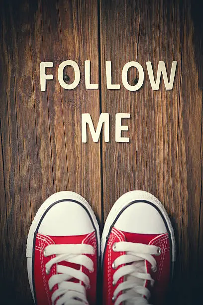 Photo of Follow Me request on wood
