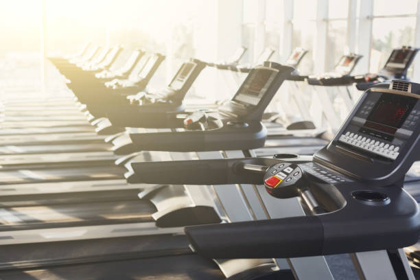 istock Modern gym interior equipment, treadmill control panels for cardio training 639582718