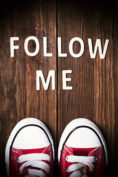 Photo of Follow Me request on wood