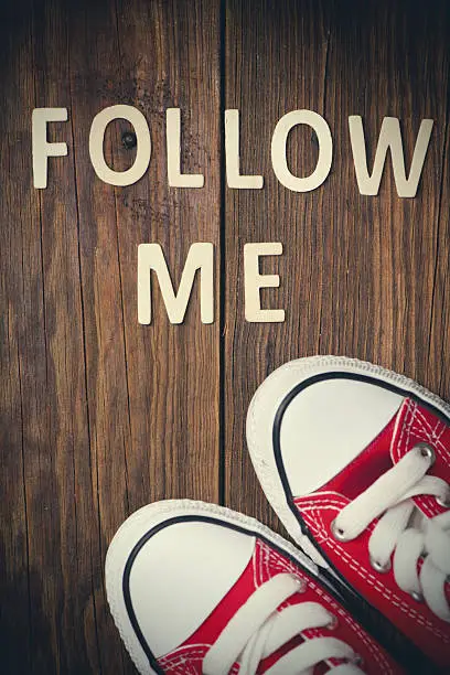 Photo of Follow Me request on wood