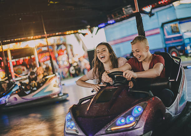 istock Couple in Bumper Cars 639588534