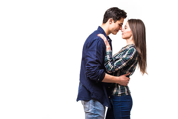 istock Young couple hugging and kissing 639588830