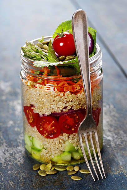 istock Cucumber, quinoa, tomato, onion, carrot and mint salad 639592400