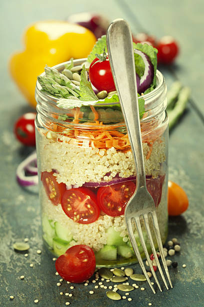 istock Cucumber, quinoa, tomato, onion, carrot and mint salad 639592468