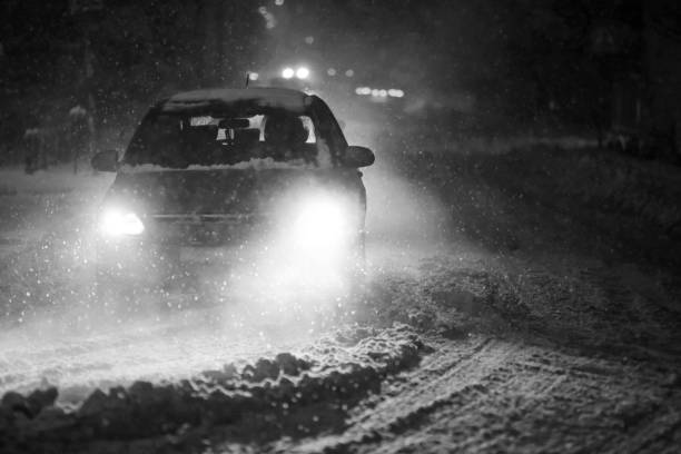 istock Snowfall at night black and white 639594518
