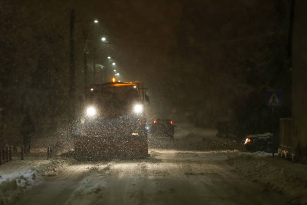 istock Snowplow cleaning streets 639594702