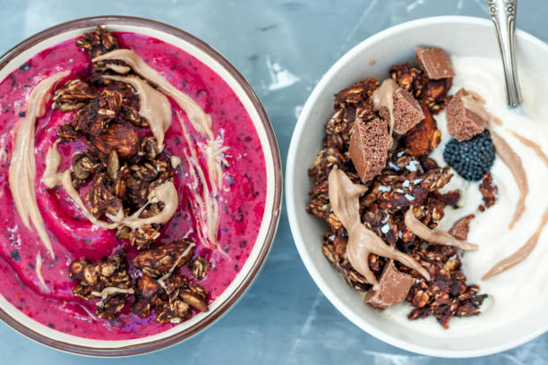 istock Smoothies bowls with chocolate muesli for a breakfast 639594704