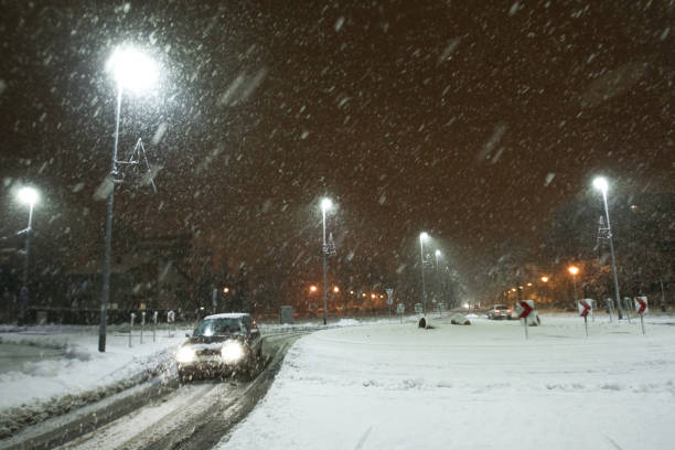 istock Snowy traffic at night 639594828