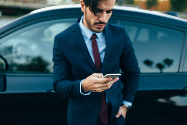 istock Young businessman texting in the city 639595934