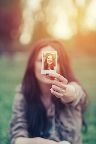 istock Girl showing selfie to the camera 639596532