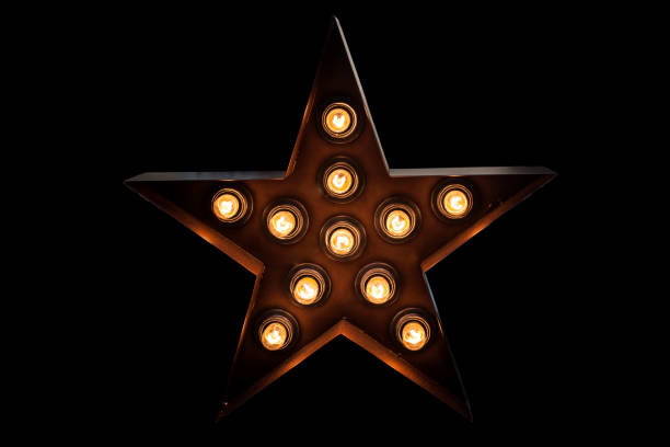 istock Lamp light shape star isolated on black background 639598352