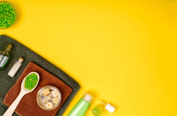 istock Spa or wellness setting in green colors. Bottles with essential 639599034