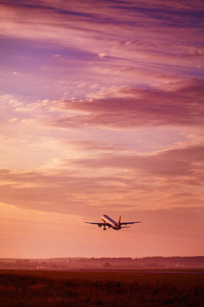 istock Airplane taking off at the sunset sky 639599202