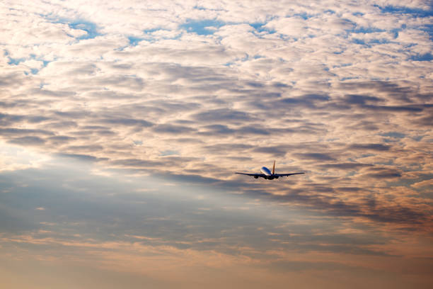 istock Airplane taking off at the sunset sky 639599492