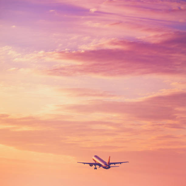 istock Airplane taking off at the sunset sky 639599558