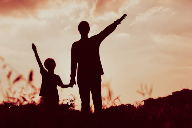 istock father and son having fun on sunset 639602258