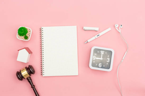 istock Top view lawyer desk, object on pink background. 639602558