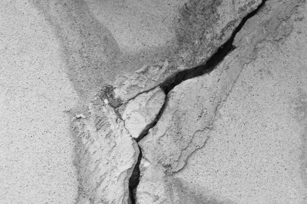 istock black and white cracked floor texture 639602870