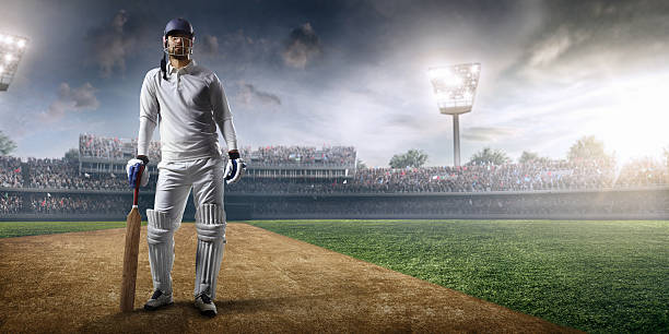 istock Cricket player batsman on the stadium 639604564