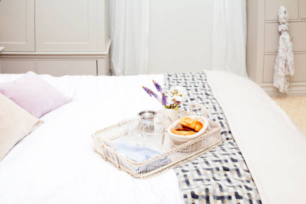 istock Bedroom interior with a breakfast on the bed 639604584