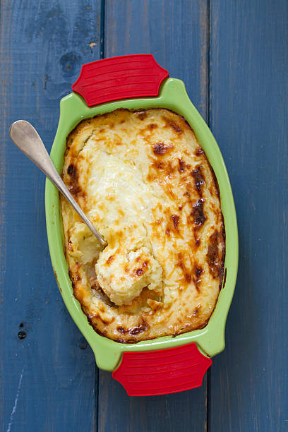 istock baked vegetables with fish in green dish 639604736