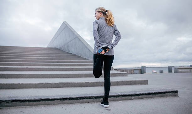 istock Fitness woman stretching before jogging 639606710