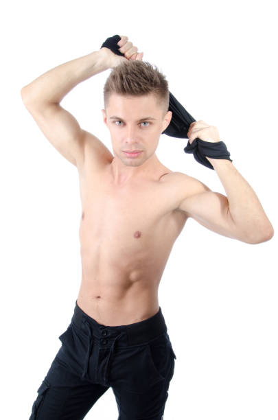 istock Sexy man undressing. White background. 639606728