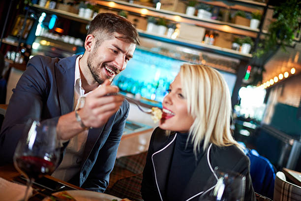 istock Man feeding a woman 639609762