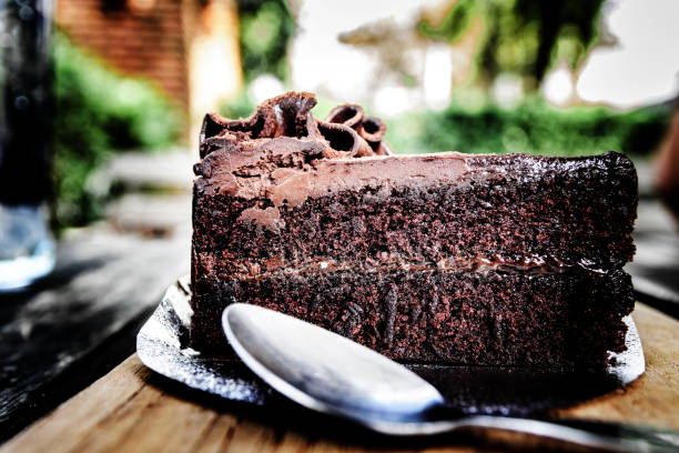 istock Tasty chocolate cake on  wooden background 639610336