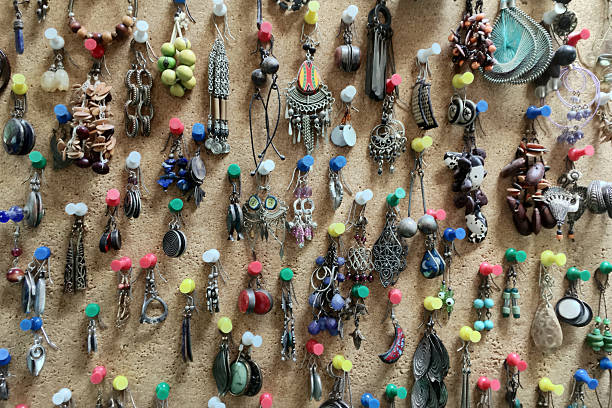 istock Earrings collection hanging on a cork wall 639610408