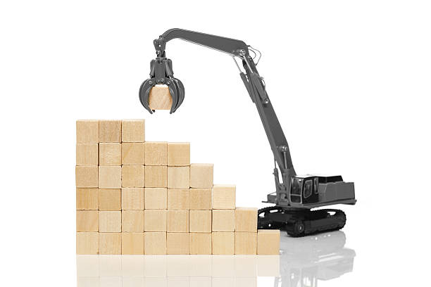 istock Crane and blank wooden  cubes 639612354