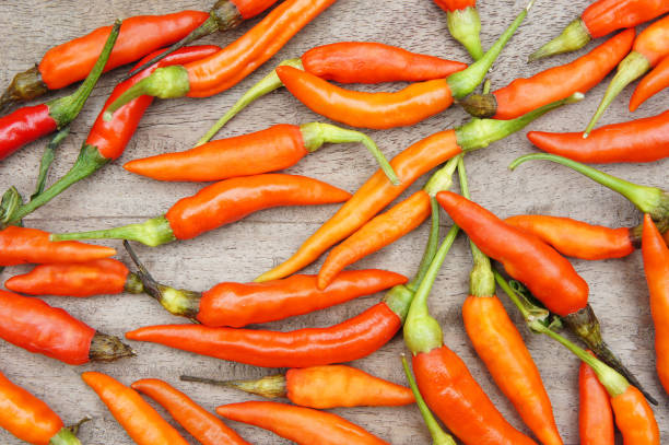 istock Red pepper on a wooden background 639613656