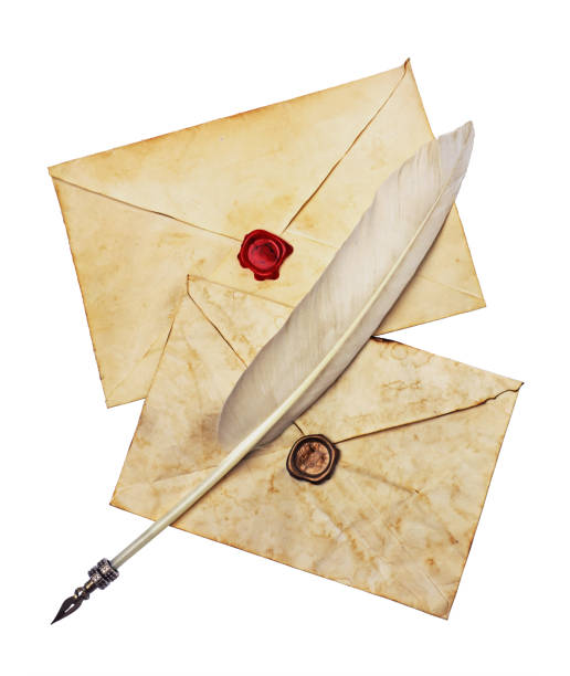 istock Two old envelopes with seal wax and feather pen 639615648