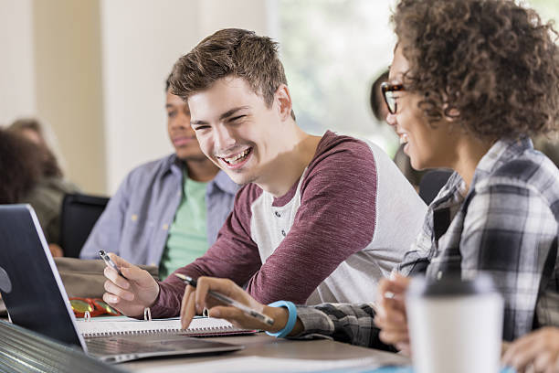 istock Cheerful diverse college students work together in class 639615852