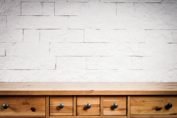 wooden shelf and a brick wall wooden shelf and wall of white bricks chest furniture stock pictures, royalty-free photos & images