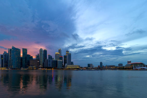 istock Sunset  over Singapore Modern Skyline 639616668