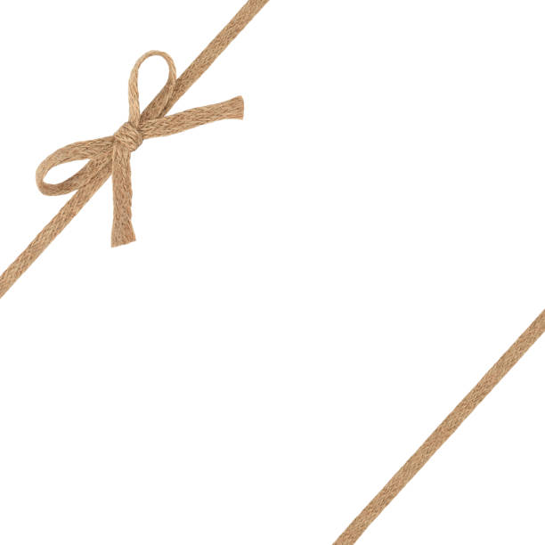 istock Burlap woven ribbon with bow isolated on white background 639616780