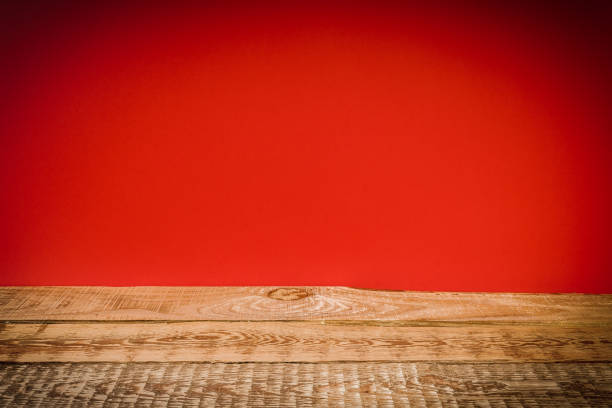 istock wooden shelf and red wall 639618312