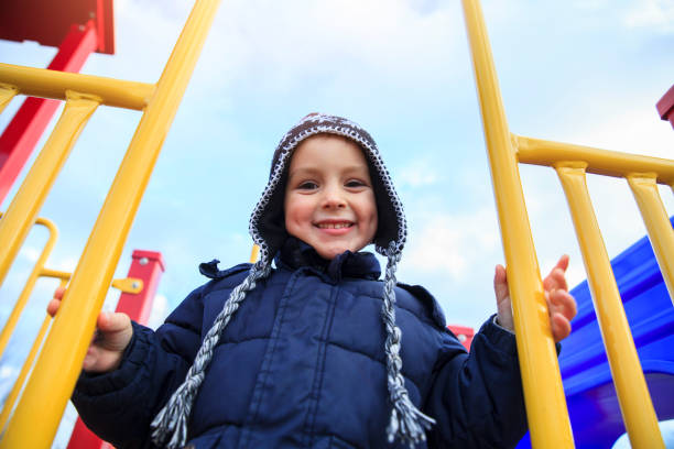 istock Happy boy at a playground 639618418