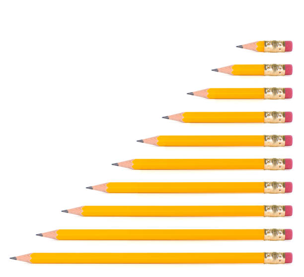 istock Different sizes of yellow pencils on white background 639621482