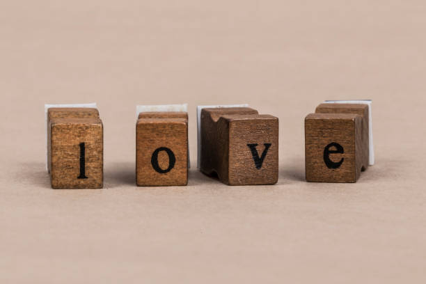istock love written with wooden cube letters 639625098