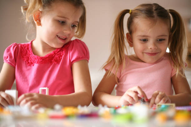 istock Girls playing at home. 639625236