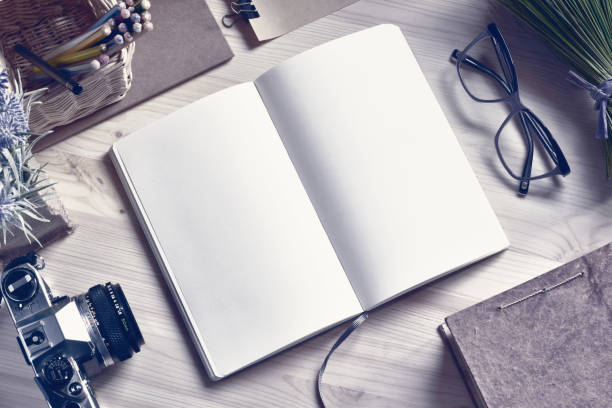 istock Paper Notepad On Wooden Table. 639625284