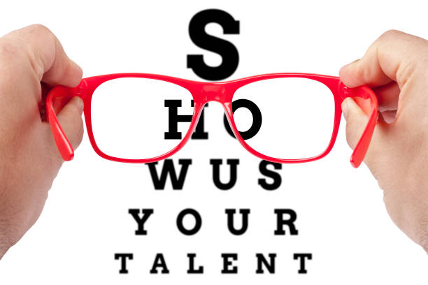 istock Red spectacles focusing Show us your talent  eye chart test 639626156