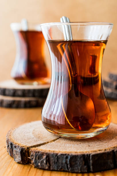 istock Traditional Turkish tea with spoon on wooden surface 639626180