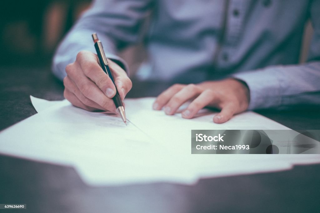 agreement agreement  business  businessman  contract  documents  law  lawyer  legal  paper  pen  sign  signature  signing  writer  writing Adult Stock Photo