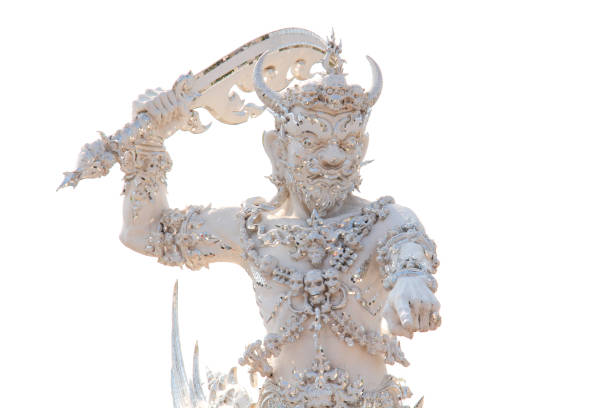Pointing Yaksha or Giant from Thai-Buddhist Myth in Front of Hell Gate. A Sculpture in Wat Rong Khun or White Temple, Chiang Rai, Thailand. Clear Background.