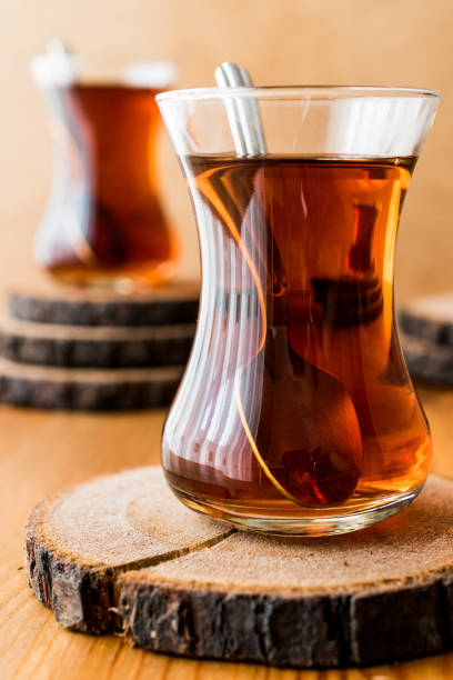 istock Traditional Turkish tea with spoon on wooden surface 639626930