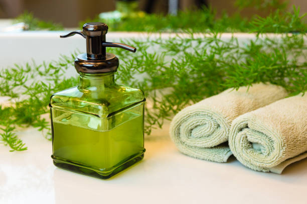 istock Pump bottle with liquid soap and towels on bathroom countertop 639627504
