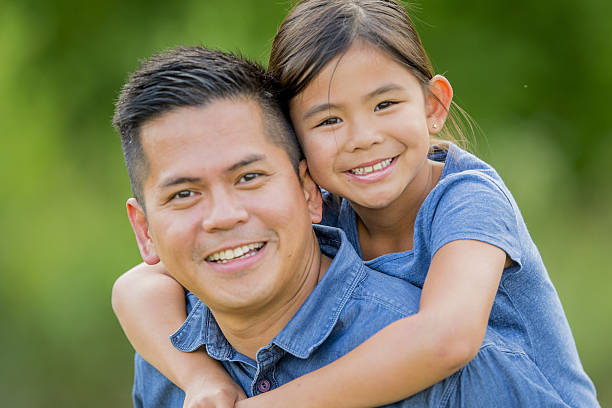 istock Piggy Back Rides at the Park 639628500